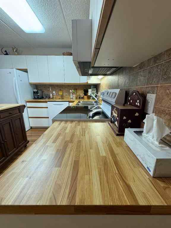 MLS® A2245035 - Unit #202 4522 47a Avenue  in Downtown Red Deer Red Deer, Residential