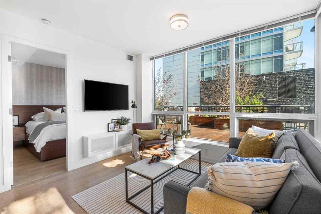 MLS® A2245069 - Unit #102 128 2 Street SW in Chinatown Calgary, Residential