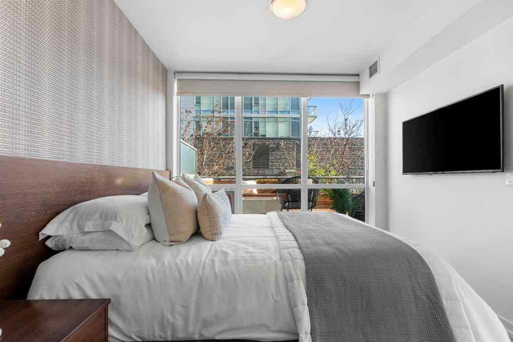 MLS® A2245069 - Unit #102 128 2 Street SW in Chinatown Calgary, Residential