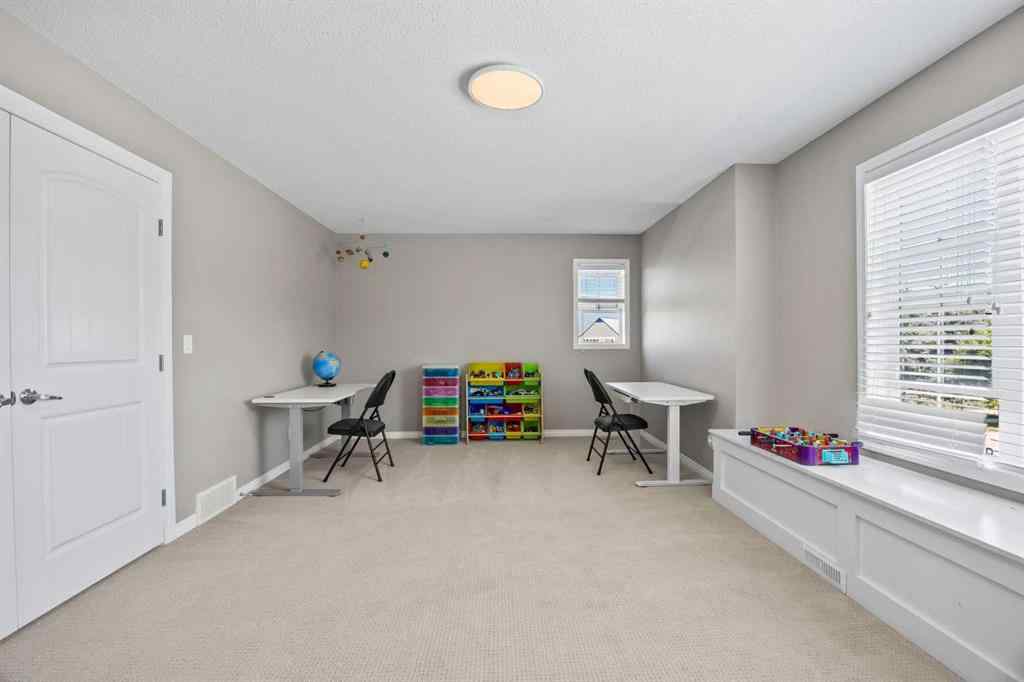 MLS® A2245108 - 184 Cougar Ridge Manor SW in Cougar Ridge Calgary, Residential