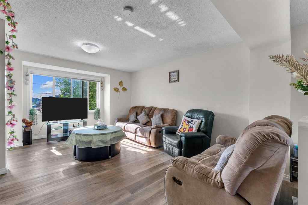 MLS® A2245120 - 8330 Saddlebrook Drive NE in Saddle Ridge Calgary, Residential