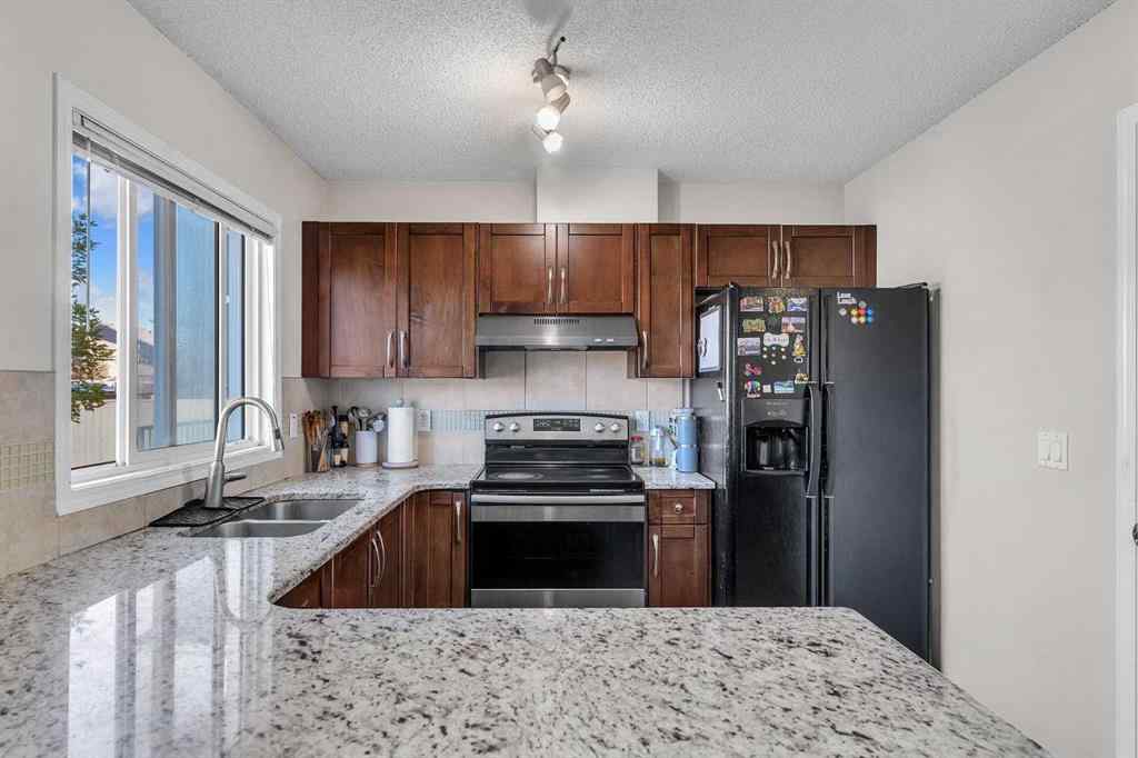 MLS® A2245120 - 8330 Saddlebrook Drive NE in Saddle Ridge Calgary, Residential