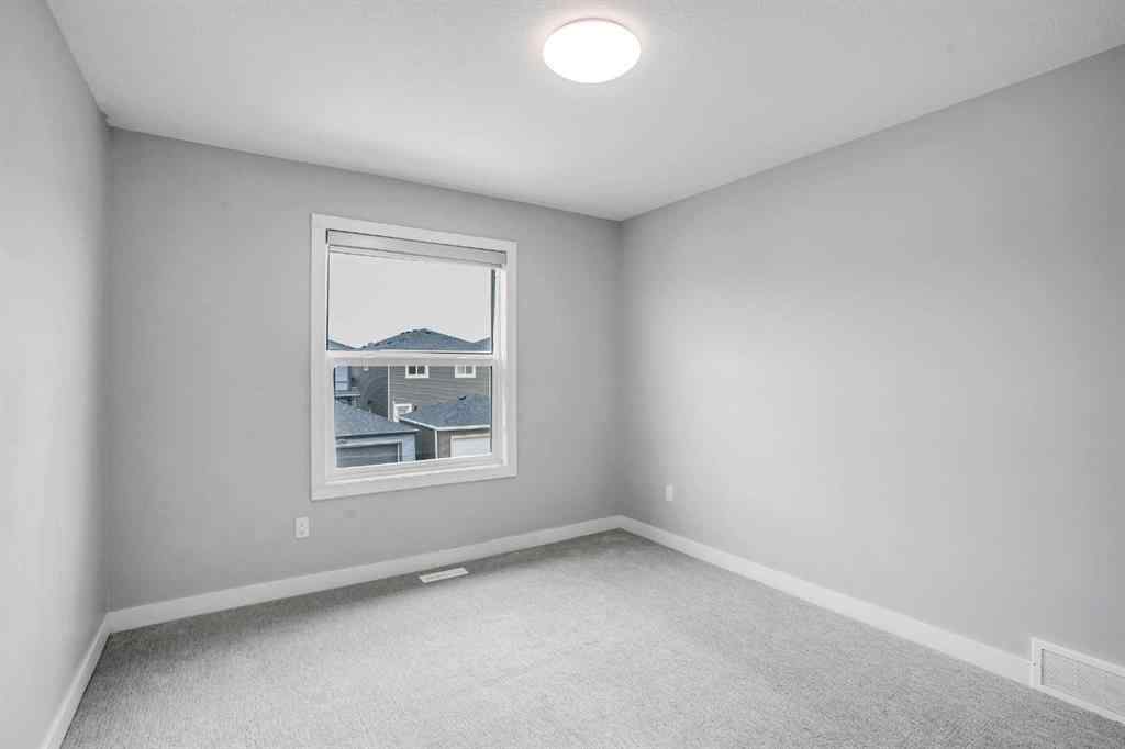 MLS® A2245133 - 62 Midtown Crossing SW in Midtown Airdrie, Residential