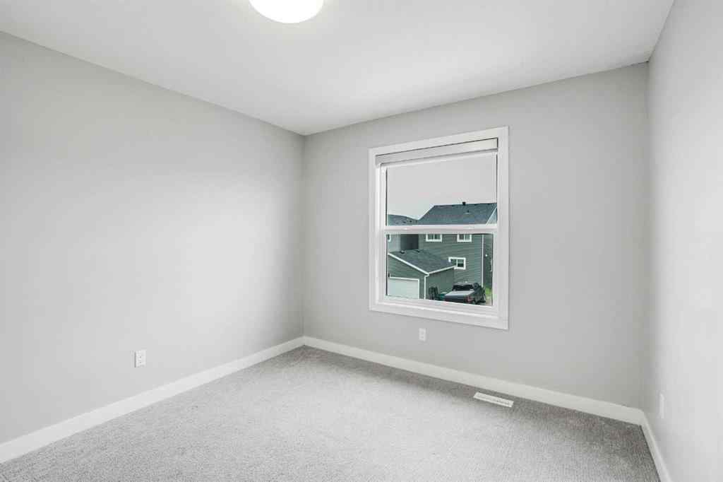 MLS® A2245133 - 62 Midtown Crossing SW in Midtown Airdrie, Residential