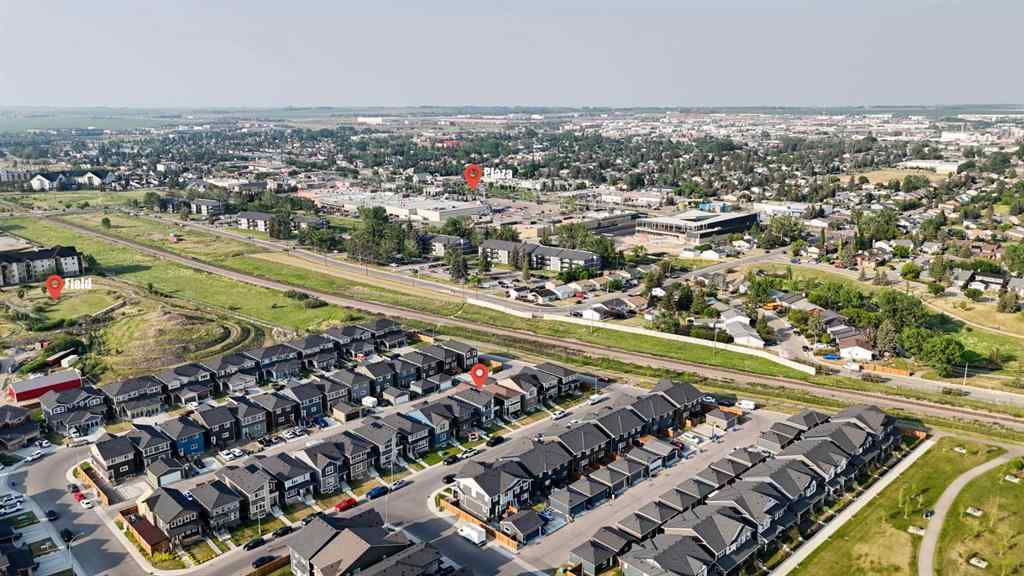 MLS® A2245133 - 62 Midtown Crossing SW in Midtown Airdrie, Residential