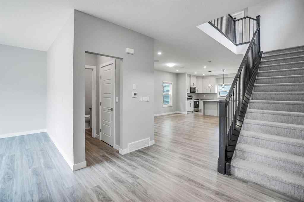 MLS® A2245133 - 62 Midtown Crossing SW in Midtown Airdrie, Residential