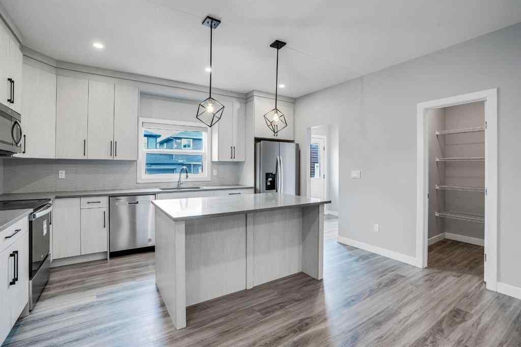 MLS® A2245133 - 62 Midtown Crossing SW in Midtown Airdrie, Residential
