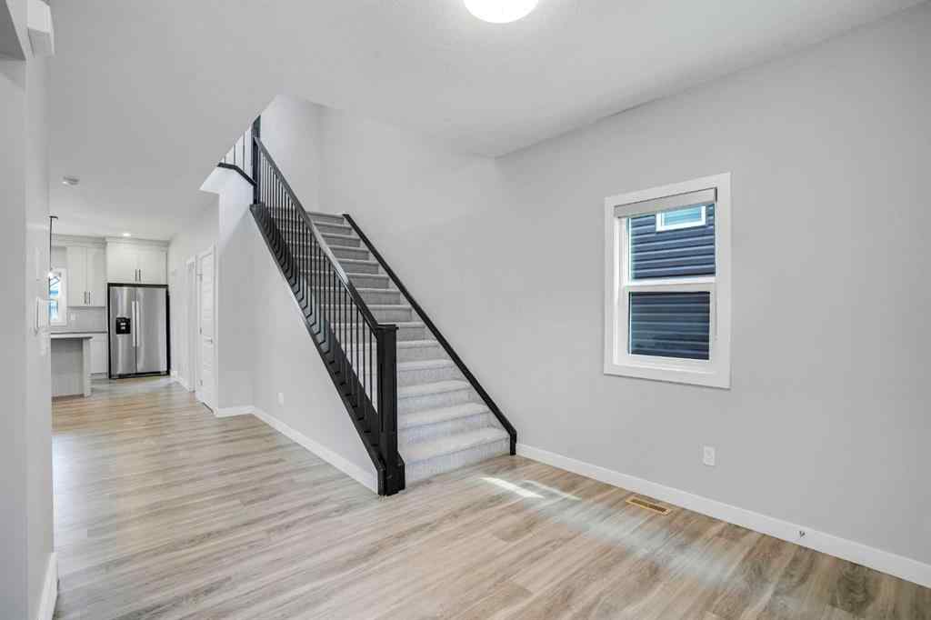 MLS® A2245133 - 62 Midtown Crossing SW in Midtown Airdrie, Residential