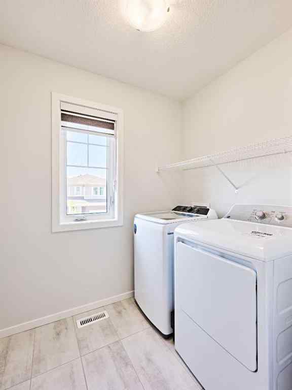 MLS® A2245218 - 155 Carringham Road NW in Carrington Calgary, Residential