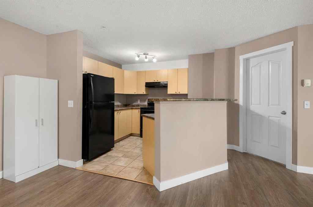 MLS® A2245228 - Unit #8225 304 Mackenzie Way SW in Luxstone Airdrie, Residential