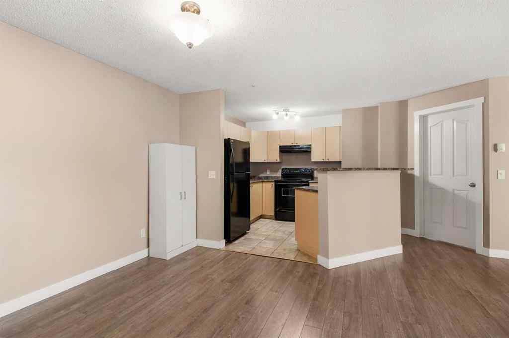 MLS® A2245228 - Unit #8225 304 Mackenzie Way SW in Luxstone Airdrie, Residential