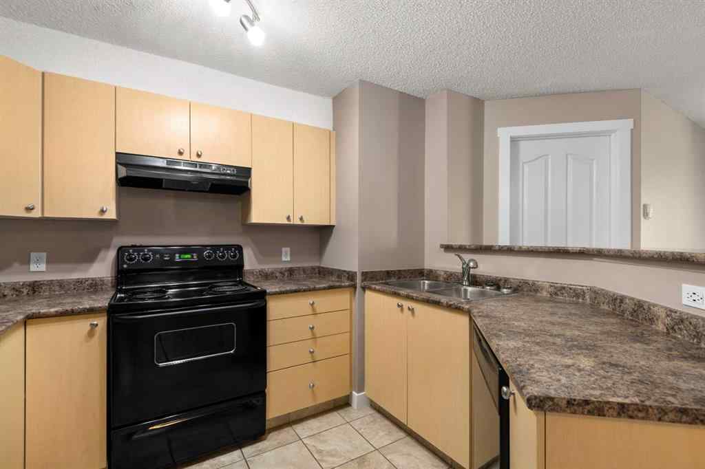 MLS® A2245228 - Unit #8225 304 Mackenzie Way SW in Luxstone Airdrie, Residential
