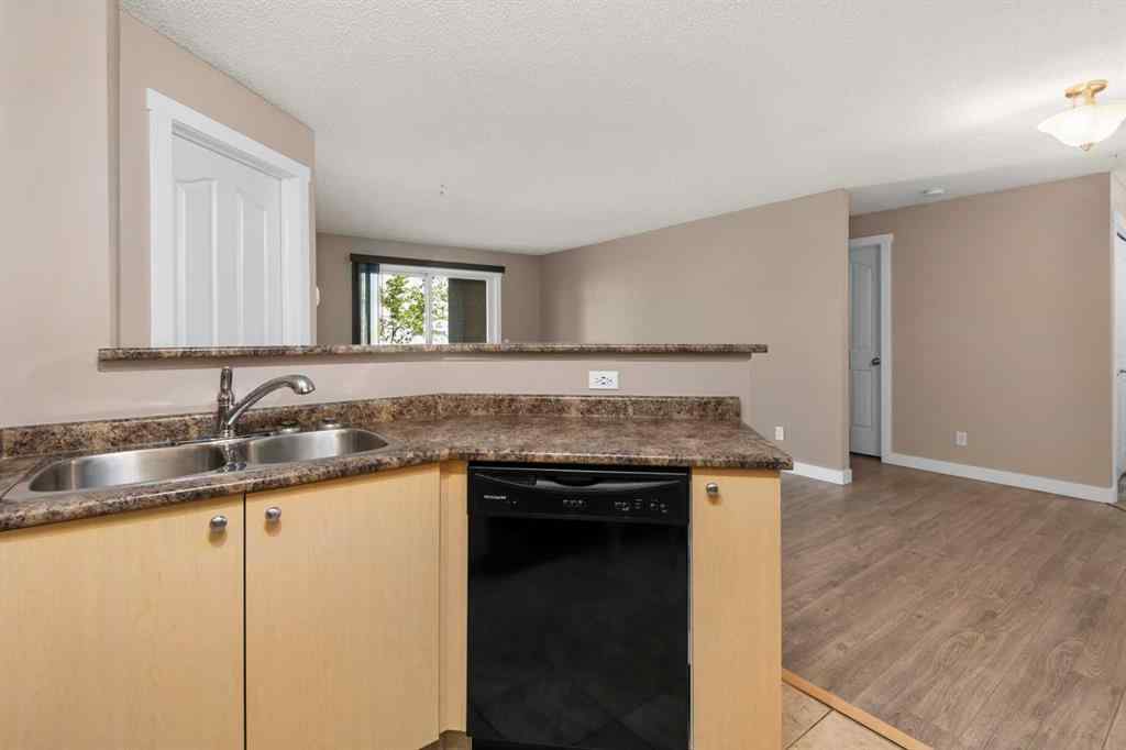 MLS® A2245228 - Unit #8225 304 Mackenzie Way SW in Luxstone Airdrie, Residential