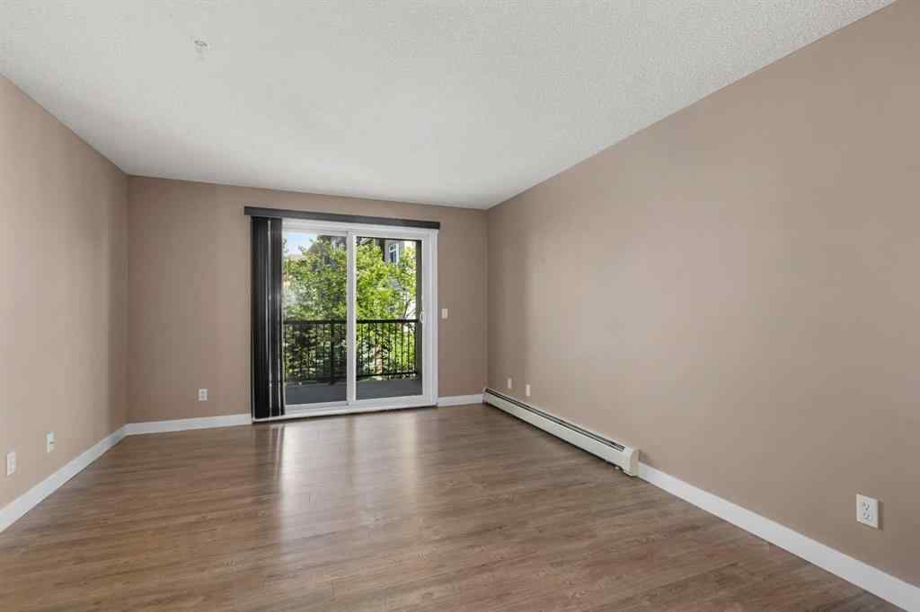 MLS® A2245228 - Unit #8225 304 Mackenzie Way SW in Luxstone Airdrie, Residential