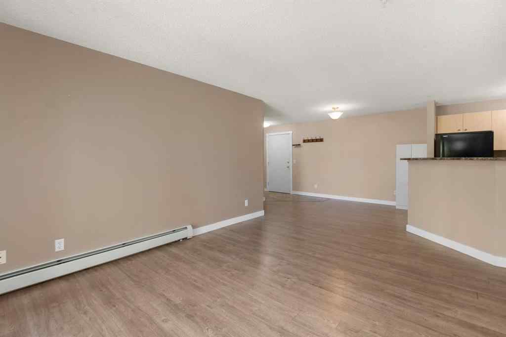 MLS® A2245228 - Unit #8225 304 Mackenzie Way SW in Luxstone Airdrie, Residential