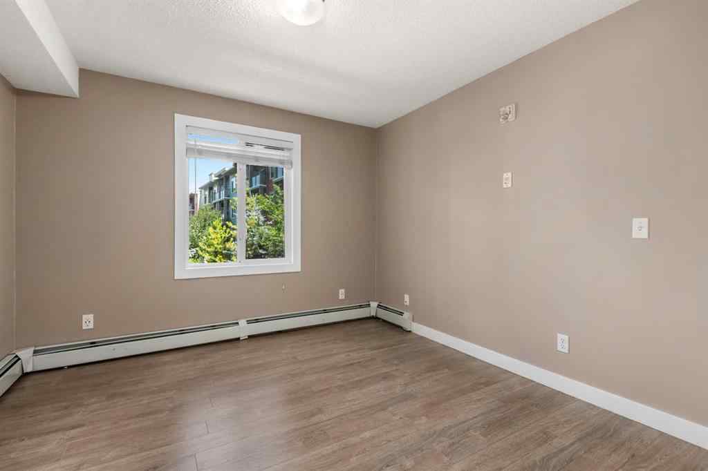 MLS® A2245228 - Unit #8225 304 Mackenzie Way SW in Luxstone Airdrie, Residential