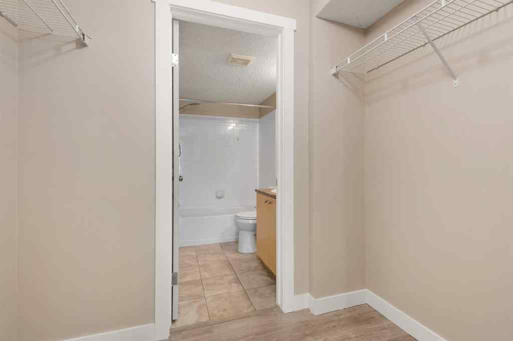 MLS® A2245228 - Unit #8225 304 Mackenzie Way SW in Luxstone Airdrie, Residential