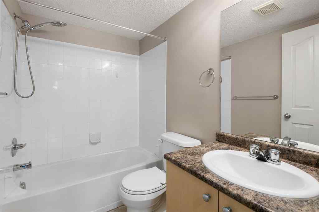 MLS® A2245228 - Unit #8225 304 Mackenzie Way SW in Luxstone Airdrie, Residential