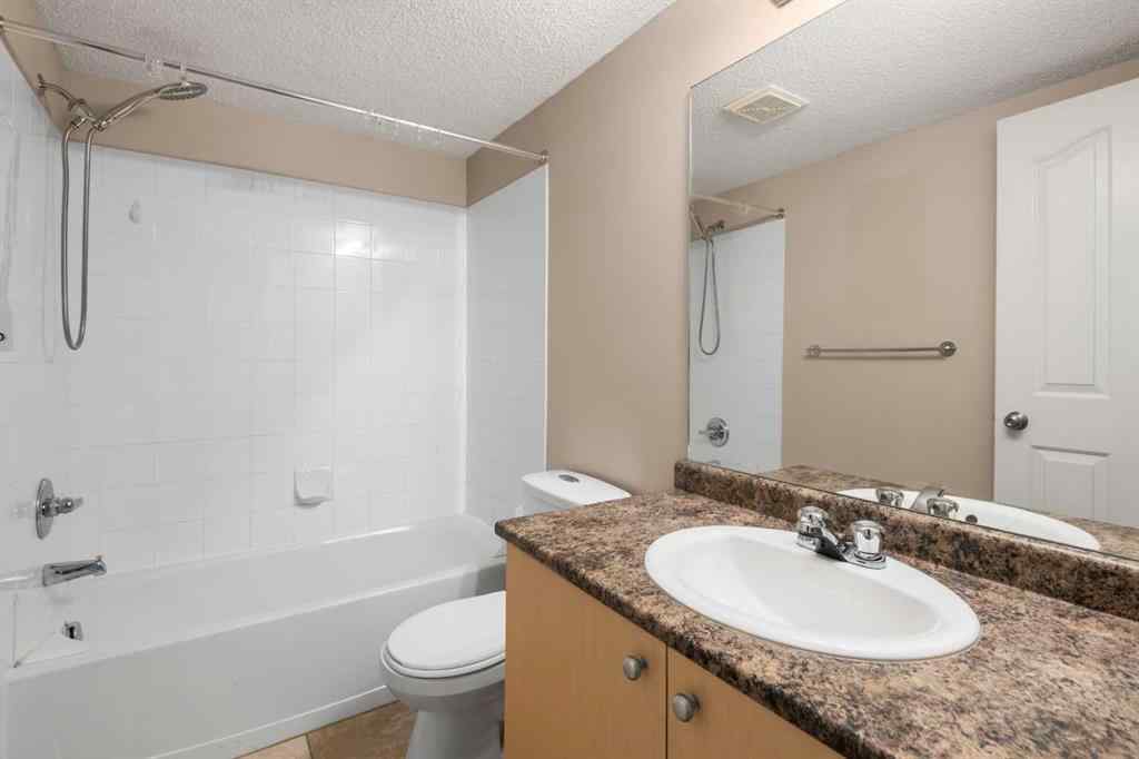 MLS® A2245228 - Unit #8225 304 Mackenzie Way SW in Luxstone Airdrie, Residential