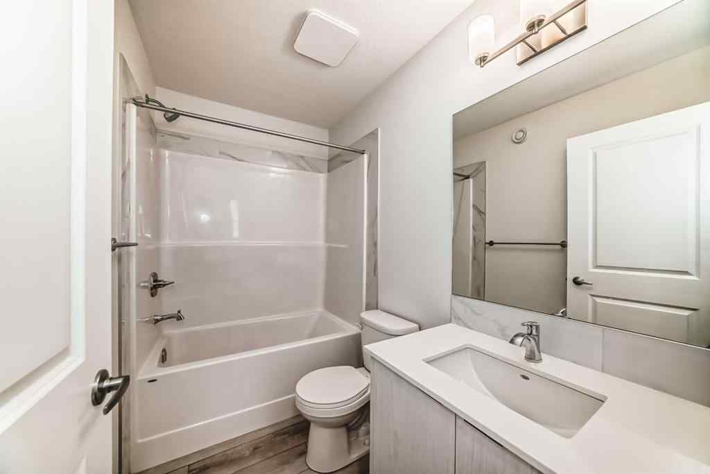 MLS® A2245235 - 21306 Sheriff King Street SW in Pine Creek Calgary, Residential