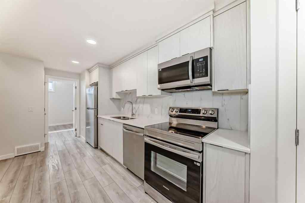MLS® A2245235 - 21306 Sheriff King Street SW in Pine Creek Calgary, Residential