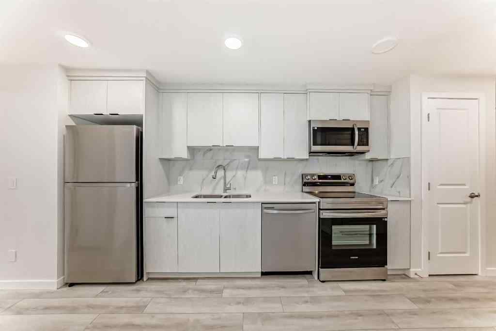 MLS® A2245235 - 21306 Sheriff King Street SW in Pine Creek Calgary, Residential