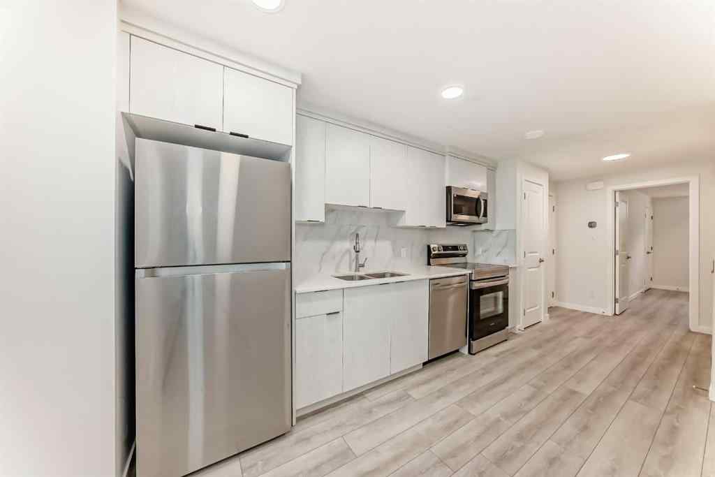 MLS® A2245235 - 21306 Sheriff King Street SW in Pine Creek Calgary, Residential