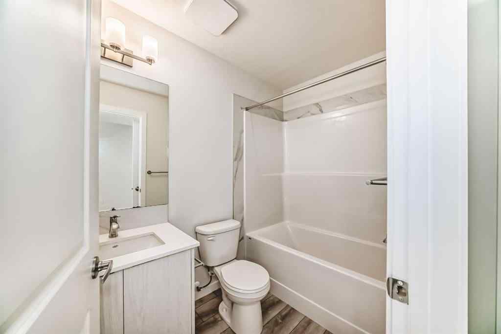 MLS® A2245235 - 21306 Sheriff King Street SW in Pine Creek Calgary, Residential