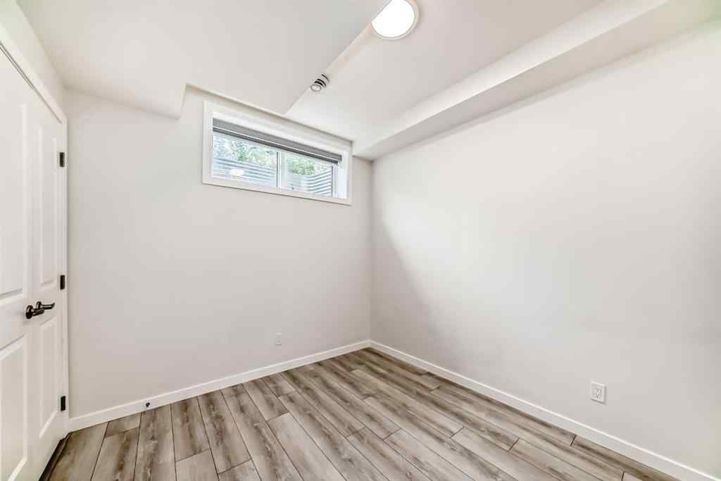 MLS® A2245235 - 21306 Sheriff King Street SW in Pine Creek Calgary, Residential