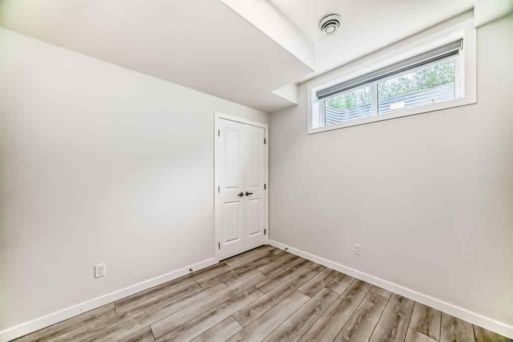 MLS® A2245235 - 21306 Sheriff King Street SW in Pine Creek Calgary, Residential