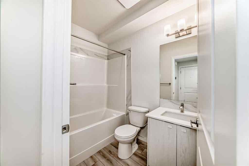 MLS® A2245235 - 21306 Sheriff King Street SW in Pine Creek Calgary, Residential