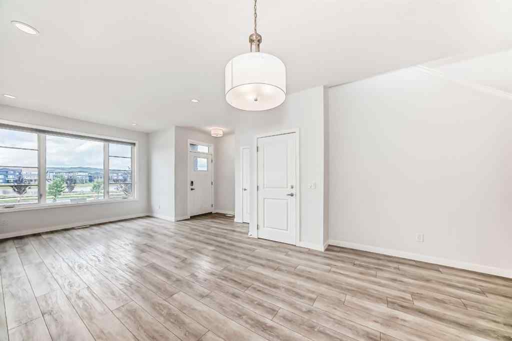 MLS® A2245235 - 21306 Sheriff King Street SW in Pine Creek Calgary, Residential