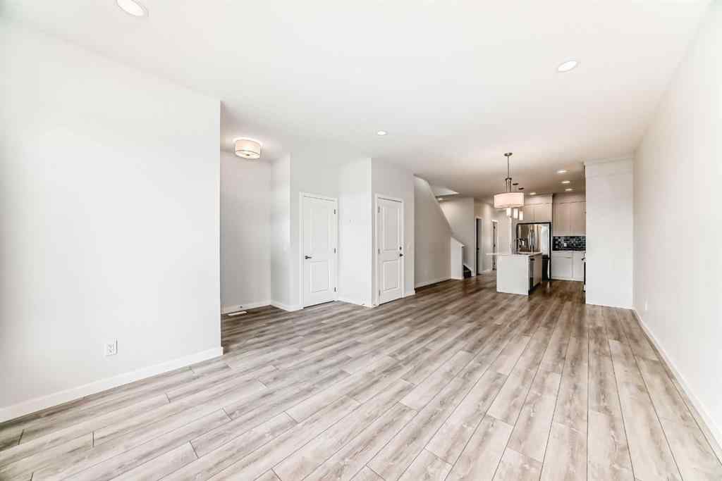 MLS® A2245235 - 21306 Sheriff King Street SW in Pine Creek Calgary, Residential