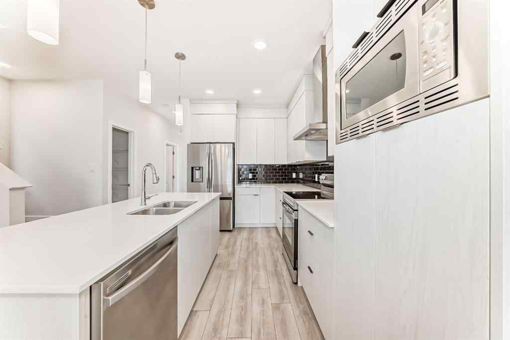 MLS® A2245235 - 21306 Sheriff King Street SW in Pine Creek Calgary, Residential