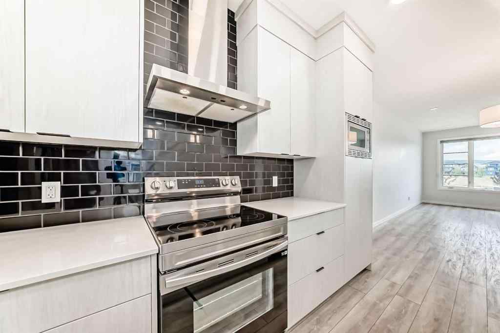 MLS® A2245235 - 21306 Sheriff King Street SW in Pine Creek Calgary, Residential