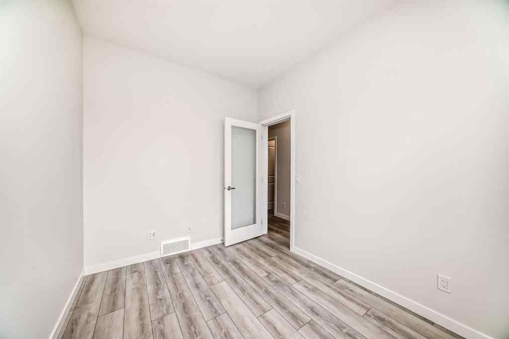 MLS® A2245235 - 21306 Sheriff King Street SW in Pine Creek Calgary, Residential