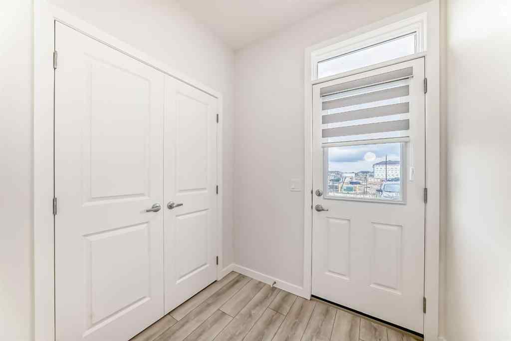 MLS® A2245235 - 21306 Sheriff King Street SW in Pine Creek Calgary, Residential
