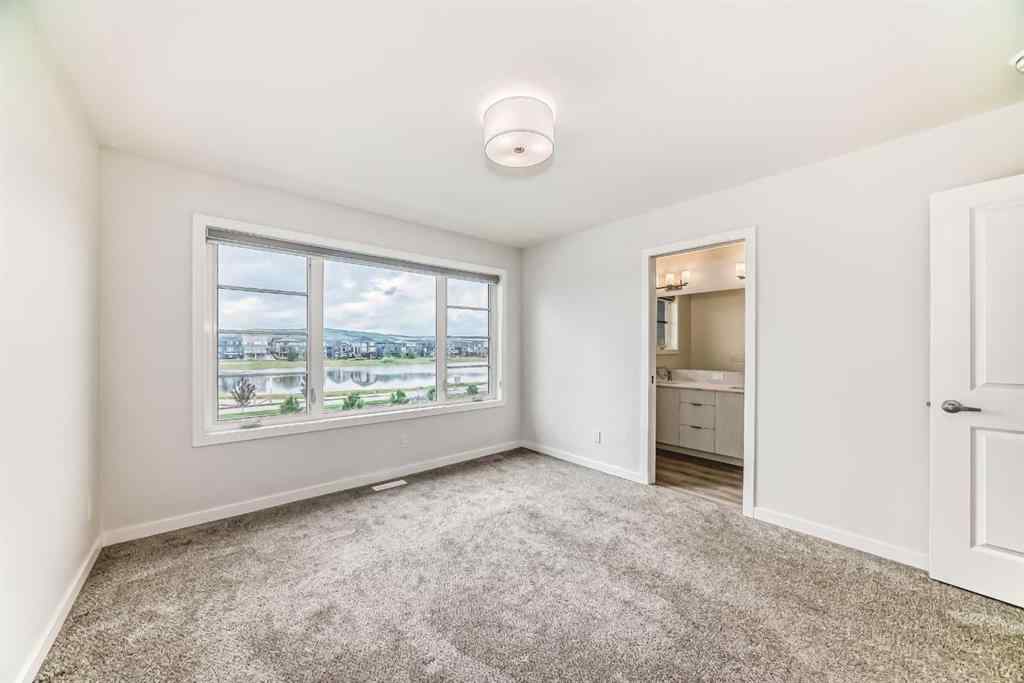 MLS® A2245235 - 21306 Sheriff King Street SW in Pine Creek Calgary, Residential