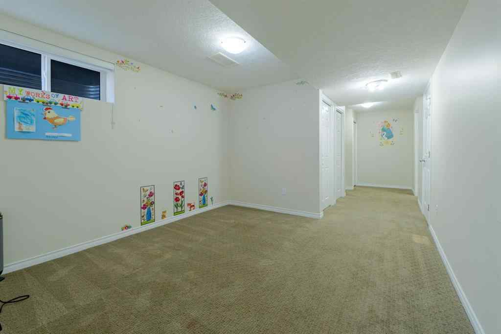 MLS® A2245257 - 144 Saddlecrest Place NE in Saddle Ridge Calgary, Residential