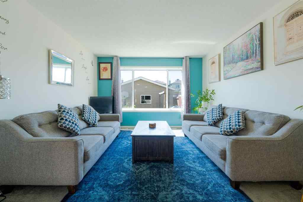 MLS® A2245257 - 144 Saddlecrest Place NE in Saddle Ridge Calgary, Residential