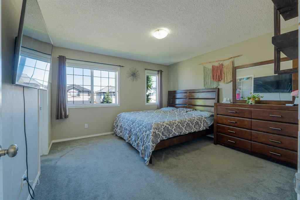 MLS® A2245257 - 144 Saddlecrest Place NE in Saddle Ridge Calgary, Residential