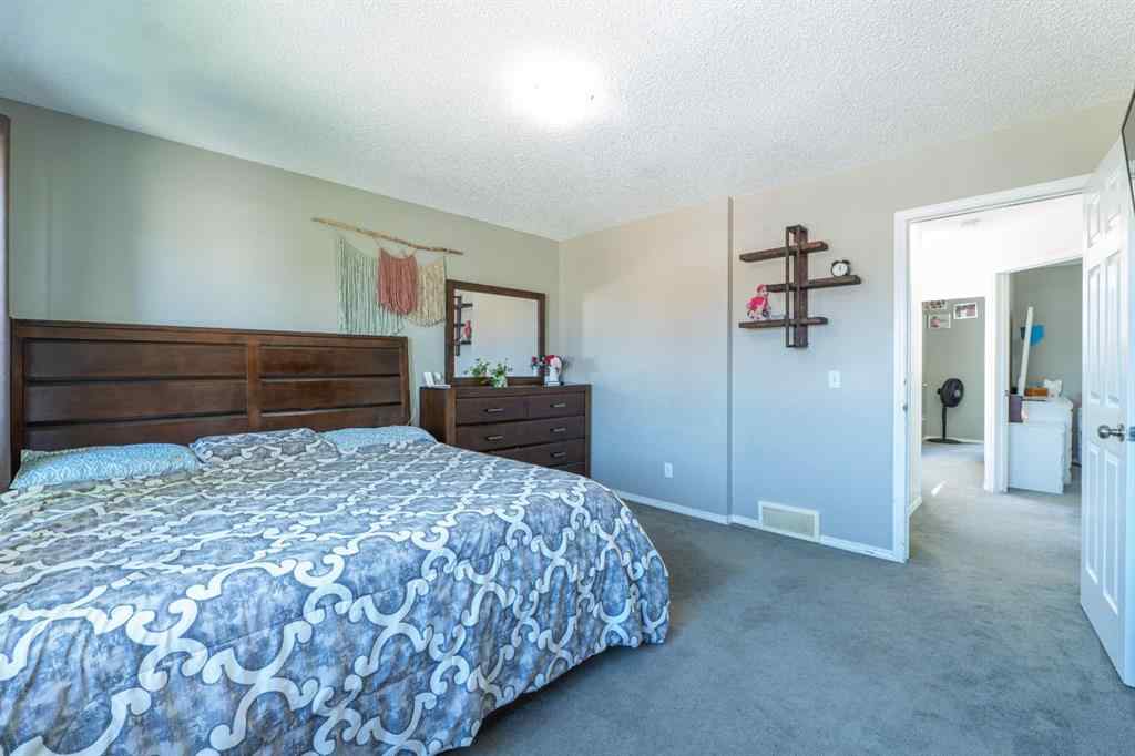 MLS® A2245257 - 144 Saddlecrest Place NE in Saddle Ridge Calgary, Residential
