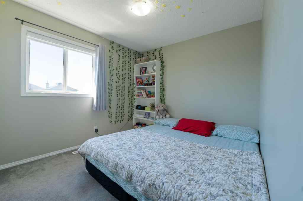 MLS® A2245257 - 144 Saddlecrest Place NE in Saddle Ridge Calgary, Residential