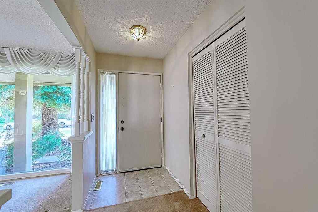 MLS® A2245281 - 84 Sunmount Close SE in Sundance Calgary, Residential