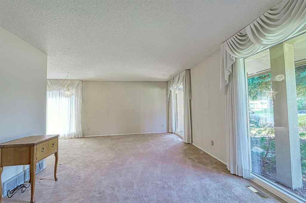 MLS® A2245281 - 84 Sunmount Close SE in Sundance Calgary, Residential