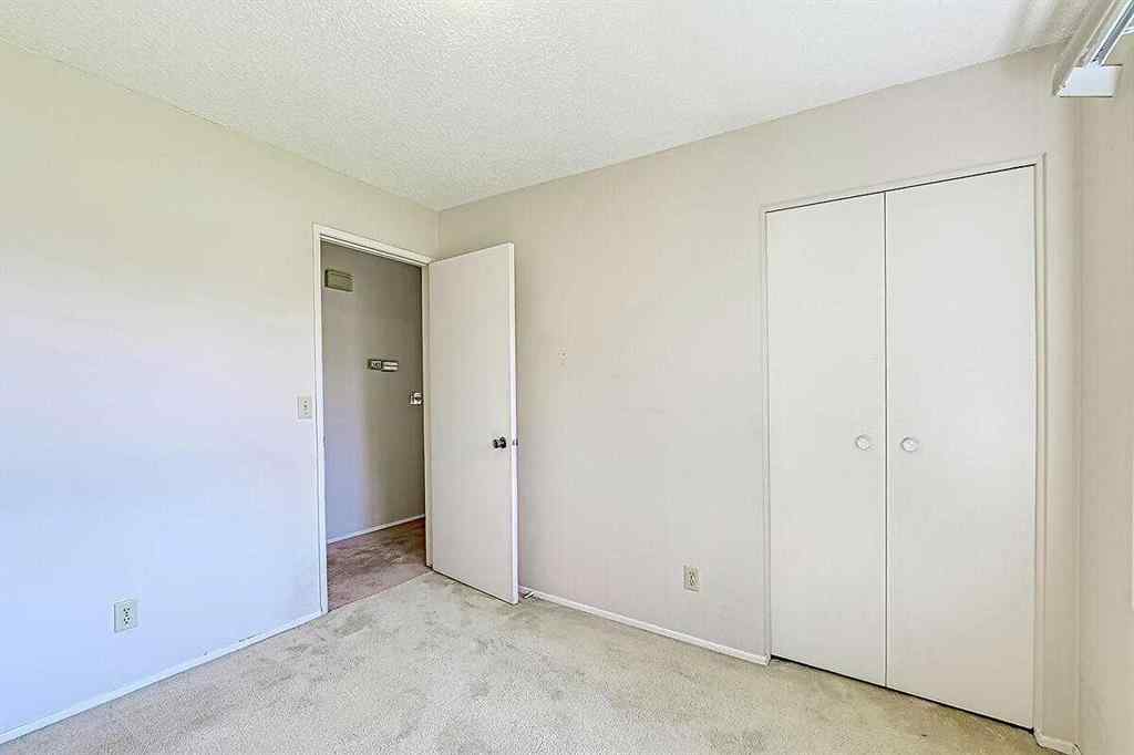 MLS® A2245281 - 84 Sunmount Close SE in Sundance Calgary, Residential