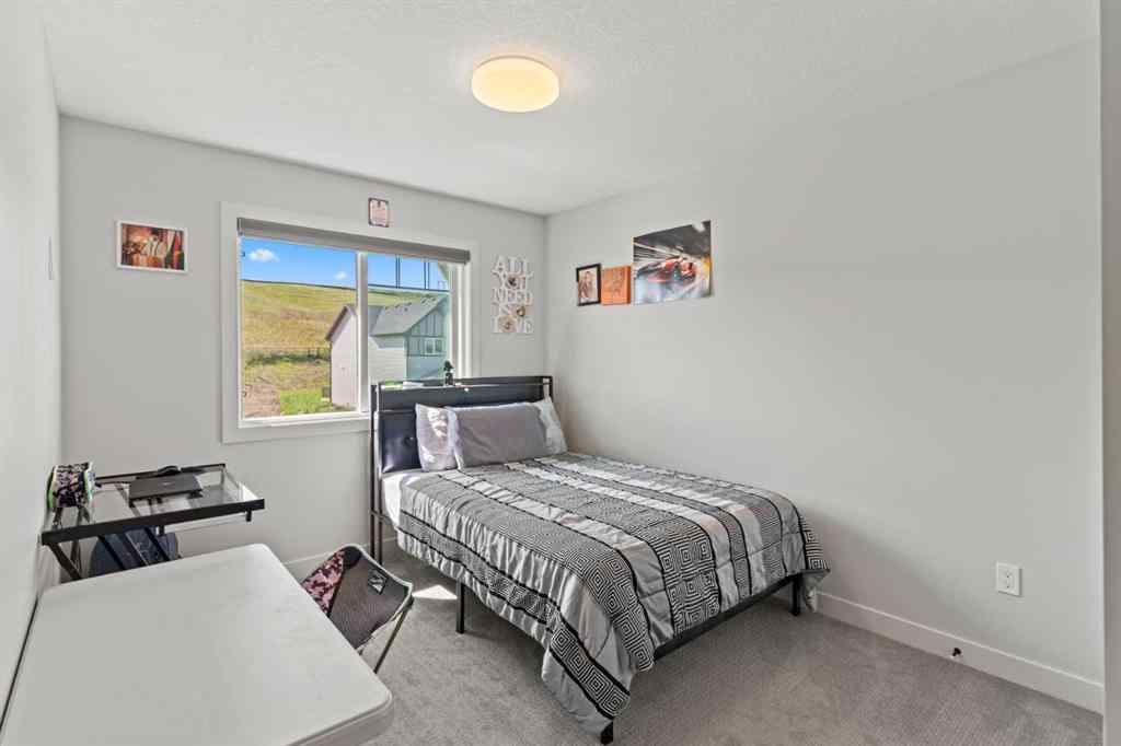 MLS® A2245283 - 1030 Fowler Road SW in Key Ranch Airdrie, Residential
