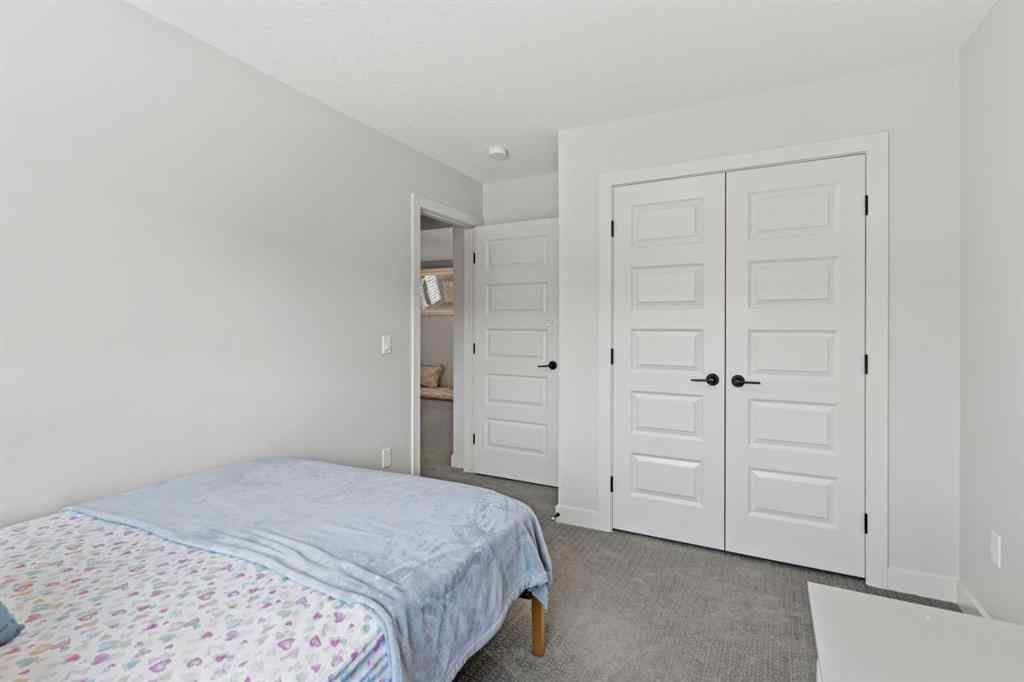 MLS® A2245283 - 1030 Fowler Road SW in Key Ranch Airdrie, Residential