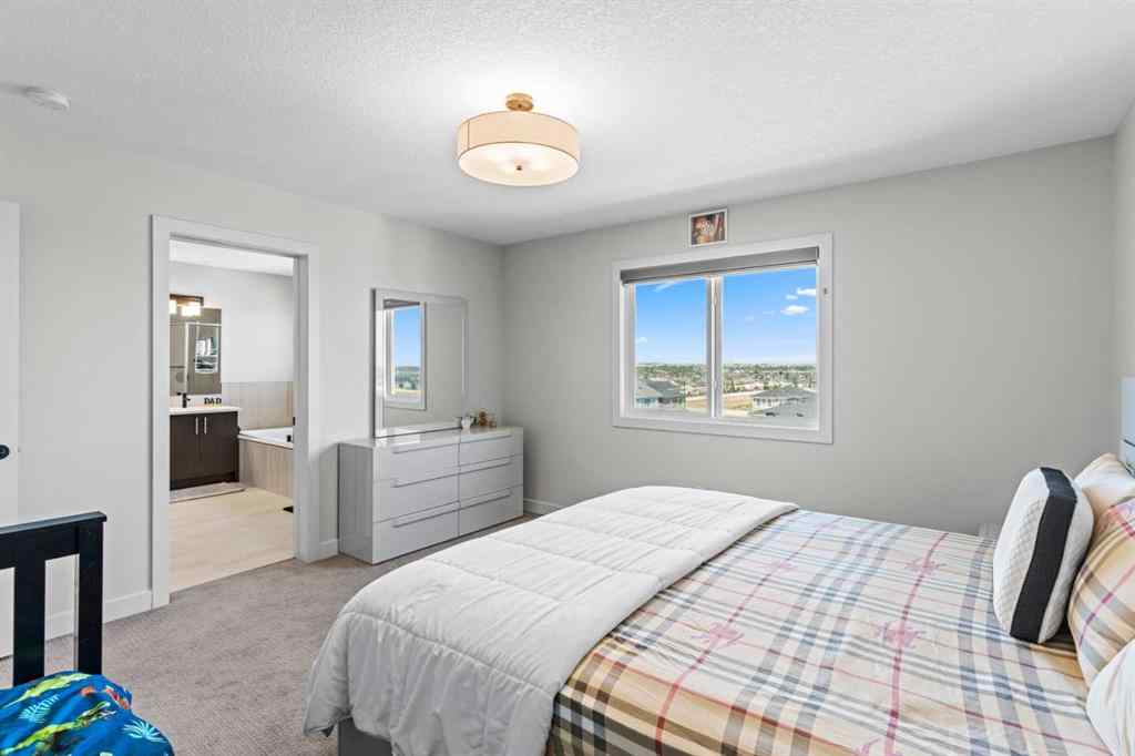 MLS® A2245283 - 1030 Fowler Road SW in Key Ranch Airdrie, Residential