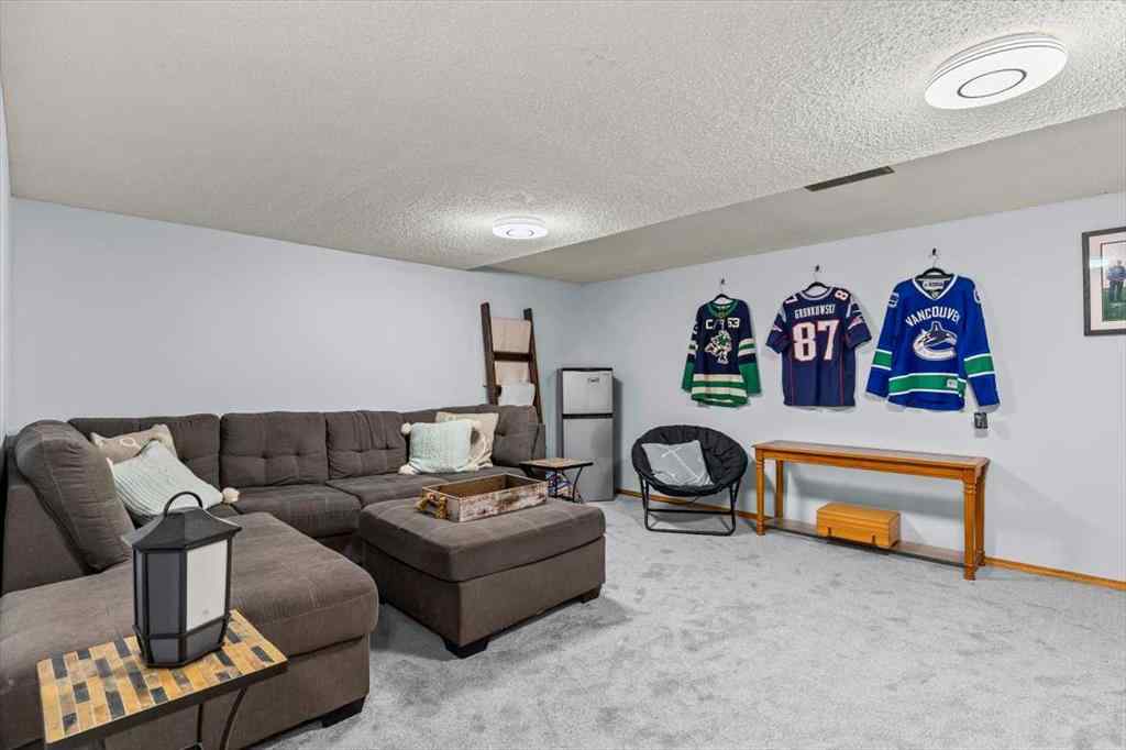 MLS® A2245315 - 88 Sundown Green SE in Sundance Calgary, Residential
